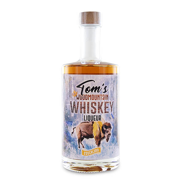 Tom's Woodmountain Whiskey-Liqueur 0,5 l von Tom's Fin Gin-slides